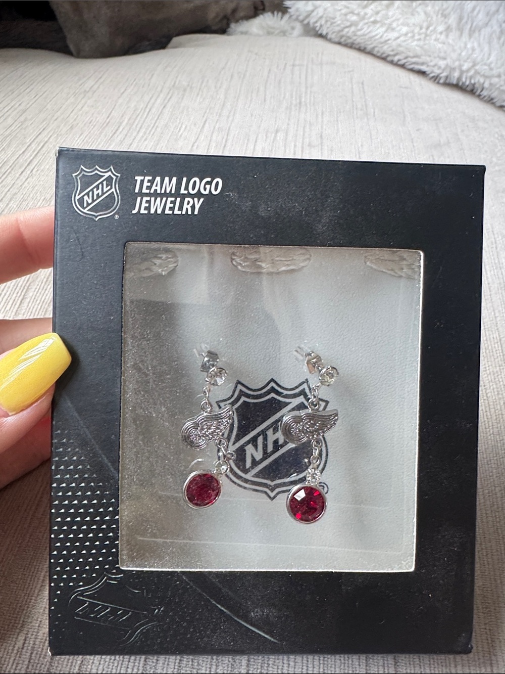 NHL Silver Wing Logo Earrings with Red Crystal Drops